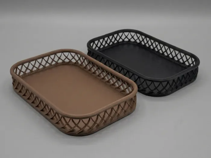 Two printed lattice trays in brown and black.