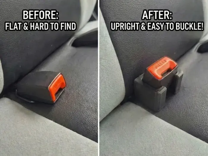 A printed holder keeping a rear seatbelt buckle upright.